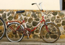 Someone's bicycle needs a bit of air in the back tire