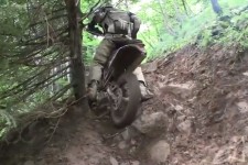 Wheel spinning, wet tree root, slippy steep hill = Going no where