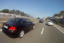This car driver nearly knocked me off as he forced his way passed This car driver nearly knocked me off as he forced his way passed