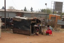There are many stalls like this selling fruit at the side of the road There are many stalls like this selling fruit at the side of the road