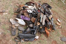 A pile of old shoes outside the shoe shop A pile of old shoes outside the shoe shop
