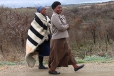 Some locals walking at the side of the road Some locals walking at the side of the road