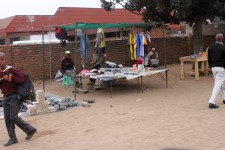 There are loads of stalls selling all kinds of things at the side of the road There are loads of stalls selling all kinds of things at the side of the road