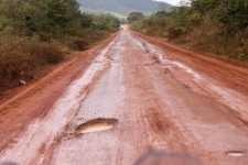 The road heading to the boarder, don't fall down a hole The road heading to the boarder, don't fall down a hole