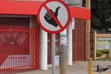 This sign means - No thumbing for a lift This sign means - No thumbing for a lift