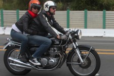 A sweet CB Honda and a rad looking couple riding as one