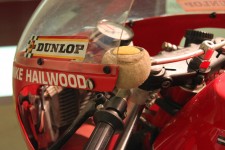 Mike The Bike - Note the cut tennis ball which contains a sponge so he can wipe his visor clean while racing the IOM TT!
