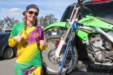 A very happy young lady and her KX250F A very happy young lady and her KX250F