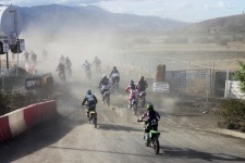Racers blast into think dust, bumps, jumps, ruts and 8 miles of rapid fun Racers blast into think dust, bumps, jumps, ruts and 8 miles of rapid fun